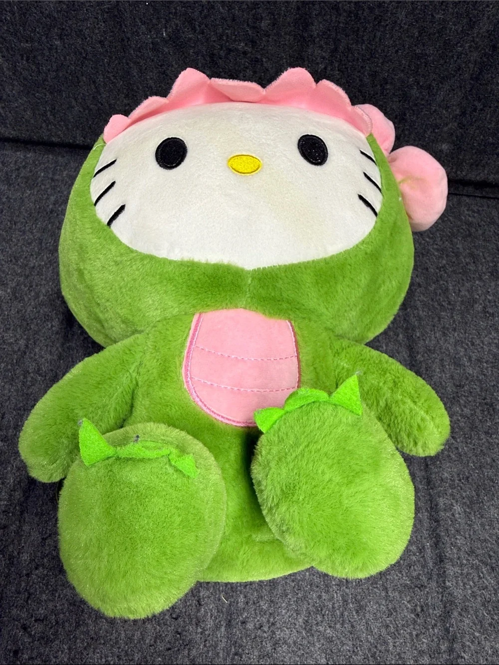 Sanrio Hello Kitty Plush in Green Dino Outfit with Pink Trim